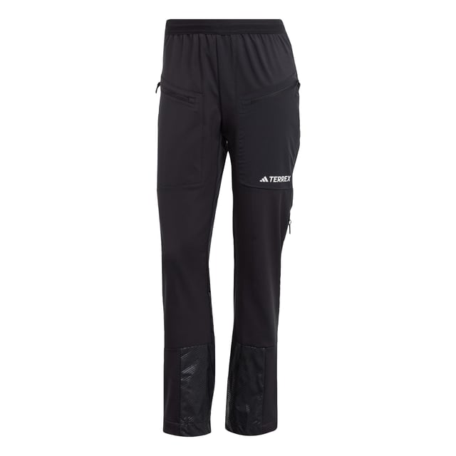 Snowshoeing, ski touring or hiking, these adidas mountain pants keep you warm without adding bulk. Cut for a slim fit and made from a combination of soft shell and stretch fabrics, they offer unrestricted range of motion. Secure the fit around your boots with the zip-adjustable cuffs to seal out dirt or snow. Side vents keep the air flowing to help regulate your temperature when you're out exploring in the elements.  - Slim fit - Drawcord on elastic waist - 100% polyester (recycled) - Thigh pockets with zip - Side vents with zip - Zip-adjustable cuffs with gusset and snap-button closure  Shipped by adidas
