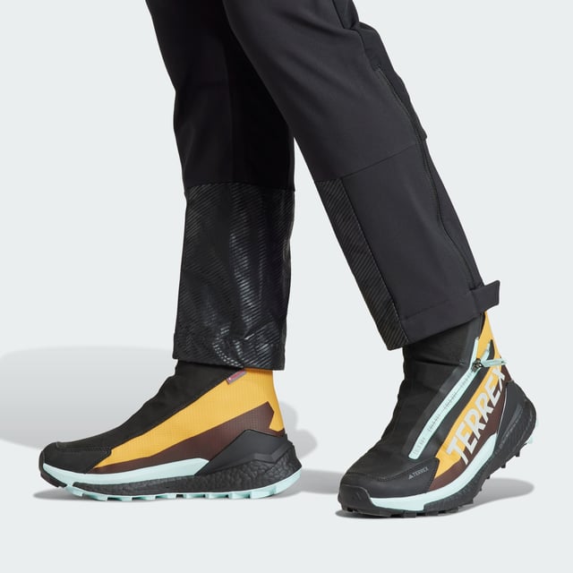Snowshoeing, ski touring or hiking, these adidas mountain pants keep you warm without adding bulk. Cut for a slim fit and made from a combination of soft shell and stretch fabrics, they offer unrestricted range of motion. Secure the fit around your boots with the zip-adjustable cuffs to seal out dirt or snow. Side vents keep the air flowing to help regulate your temperature when you're out exploring in the elements.  - Slim fit - Drawcord on elastic waist - 100% polyester (recycled) - Thigh pockets with zip - Side vents with zip - Zip-adjustable cuffs with gusset and snap-button closure  Shipped by adidas