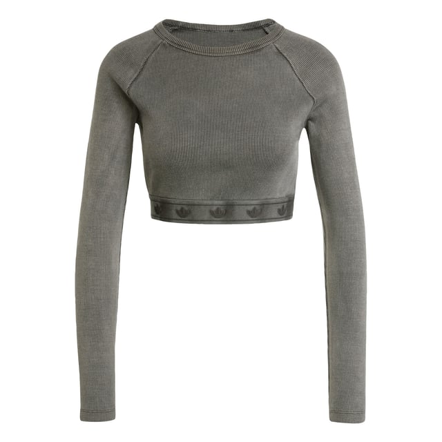 This adidas crop top is inspired by the bold attitudes and style of '90s hip hop. Soft ribbed fabric in a slim silhouette hugs the body while the long sleeves and crewneck give it a casual vibe. It's finished with a repeating Trefoil graphic along the hem.  - Slim fit with crop length - Crewneck - 95% cotton, 5% elastane  Shipped by adidas