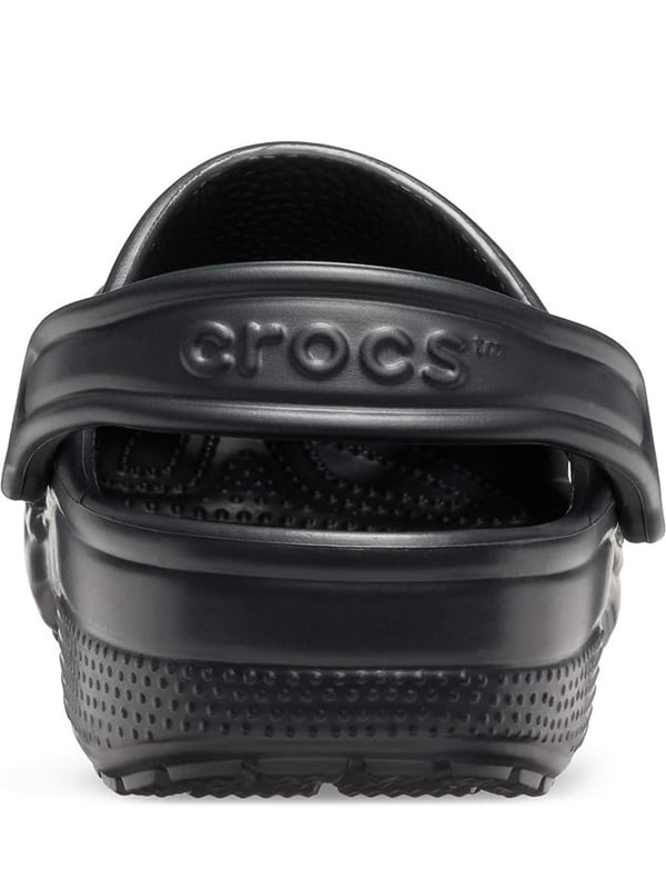 Step into comfort with the Croc Classic Clog, designed for everyday wear and outdoor adventures. Made from fully molded Croslite  material, these clogs offer lightweight cushioning and a custom fit that molds to your foot with excellent arch support. Ventilation ports provide breathability and help water and debris drain away, making them perfect for the beach or boat. With a secure heel strap, quick-drying design, and non-marking soles, these clogs are as practical as they are comfortable.