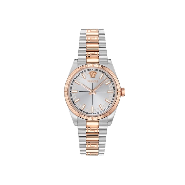 Diese Versace Millenium Analog-Uhr für Frauen ist das perfekte Zeitmessgerät zum Tragen oder Verschenken. Ihr silbernes 32 mm rundes Gehäuse kombiniert mit dem bequemen mehrfarbigen Edelstahlarmband sorgt dafür, dass Sie dieses atemberaubende Zeitstück ohne Kompromisse genießen können. Angetrieben von einem hochwertigen Quarzwerk und wasserdicht bis 3 bar, wird Ihre Uhr weiter ticken. Tauchen Sie ein in die Welt zeitloser Eleganz mit der Versace Millenium Uhr, die ein anmutiges 32 mm Gehäuse aufweist. Im Herzen zieht der furchterregende Medusakopf um 12 Uhr die Aufmerksamkeit auf sich und symbolisiert Stärke und Raffinesse. Diese Analog-Uhr ist mit leuchtenden Zeigern, leuchtenden Ziffern ausgestattet und verfügt über ein Schweizer Qualitätswerk. Das mehrfarbige Edelstahlarmband hat eine Länge von 19 cm und eine Breite von 16 mm und ist mit einem Klappverschluss versehen. Gehäusedurchmesser: 32 mm, Gehäusehöhe: 7,4 mm, Gehäusefarbe: Silber und Zifferblattfarbe: Silber.