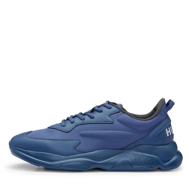 Mens HUGO Leon Running-Inspired Trainers with contrast details in navySignature trainers by HUGO  set on an EVA outsole and crafted in a mix of materials with contrast detailing and branding throughout.- Laces- Partially lined- Packaging: Box- Upper material: 100% Polyester.  Lining: 100% Polyester.  Sole: 100% Ethylene vinyl acetate.  Facing: 60% Polyester  40% Polyurethane.  Innersole: 100% Polyester.- Ref: 50517096-413