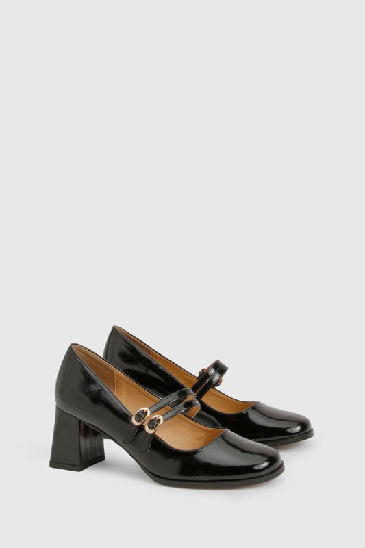 Glossy patent finish for a striking, eye-catching look
        Double strap design with elegant gold-tone buckle detailing
        Classic square toe silhouette for a modern twist on the Mary Jane style
        Comfortable mid block heel measuring between 5-6.5cm in height
        Cushioned insole for all-day wearability and comfort
    
    These Block Heel Double Strap Mary Janes from Boohoo offer a contemporary take on a timeless classic. The distinctive double strap design with polished buckle detailing creates a playful yet sophisticated silhouette that works beautifully for various occasions. Style them with cropped trousers and a crisp blouse for office attire, or pair with a floaty midi dress for family gatherings. The square toe and block heel combination delivers both stability and style, making these shoes perfect for occasions where you'll be on your feet. The patent finish adds a touch of glamour to even the simplest outfit, whilst the mid-height heel strikes the ideal balance between elegance and practicality. These versatile Mary Janes will quickly become a go-to in your footwear collection, offering endless styling possibilities throughout the seasons.