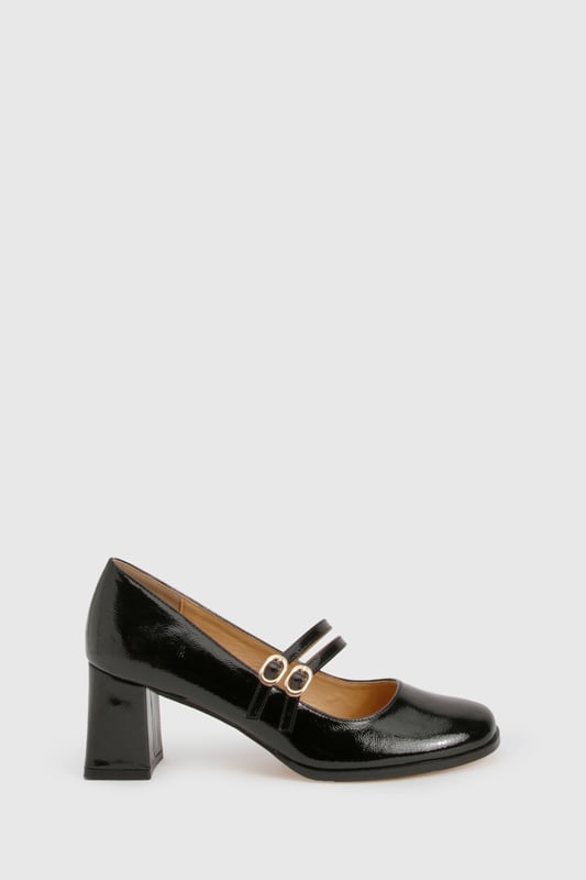 Glossy patent finish for a striking, eye-catching look
        Double strap design with elegant gold-tone buckle detailing
        Classic square toe silhouette for a modern twist on the Mary Jane style
        Comfortable mid block heel measuring between 5-6.5cm in height
        Cushioned insole for all-day wearability and comfort
    
    These Block Heel Double Strap Mary Janes from Boohoo offer a contemporary take on a timeless classic. The distinctive double strap design with polished buckle detailing creates a playful yet sophisticated silhouette that works beautifully for various occasions. Style them with cropped trousers and a crisp blouse for office attire, or pair with a floaty midi dress for family gatherings. The square toe and block heel combination delivers both stability and style, making these shoes perfect for occasions where you'll be on your feet. The patent finish adds a touch of glamour to even the simplest outfit, whilst the mid-height heel strikes the ideal balance between elegance and practicality. These versatile Mary Janes will quickly become a go-to in your footwear collection, offering endless styling possibilities throughout the seasons.