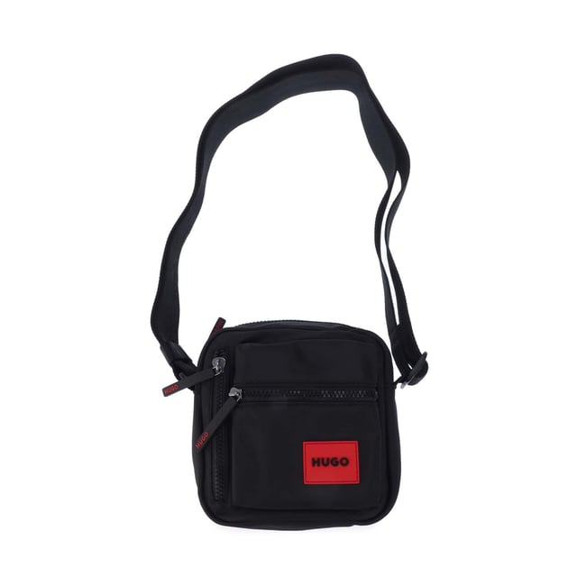 Hugo Boss Ethon 2.0 Crossbody Bag in black.- One main compartment.- Adjustable shoulder strap.- Two zip pockets on the front.- One slip pocket.- 100% Polyester.- Ref: 50535643002