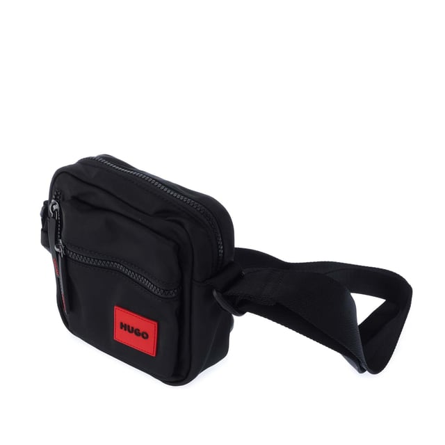 Hugo Boss Ethon 2.0 Crossbody Bag in black.- One main compartment.- Adjustable shoulder strap.- Two zip pockets on the front.- One slip pocket.- 100% Polyester.- Ref: 50535643002