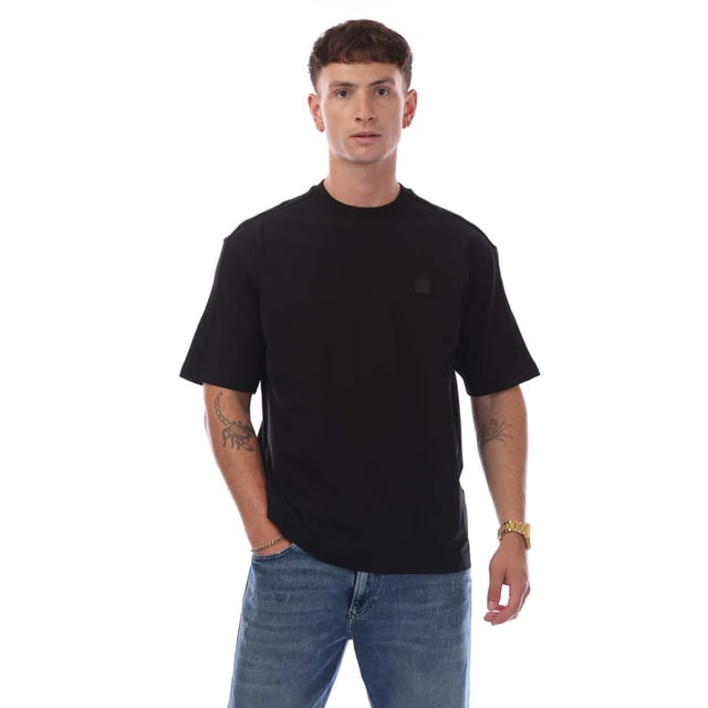 Mens Hugo Boss Nylon Front Crewneck T- Shirt in black.- Ribbed crewneck.- Short sleeves.- Front nylon panel.- Boss square logo on left chest.- Soft and breathable fabric.- Relaxed fit.- 100% Cotton.- Ref: 50531877001