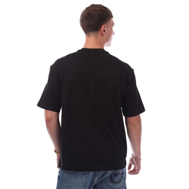 Mens Hugo Boss Nylon Front Crewneck T- Shirt in black.- Ribbed crewneck.- Short sleeves.- Front nylon panel.- Boss square logo on left chest.- Soft and breathable fabric.- Relaxed fit.- 100% Cotton.- Ref: 50531877001