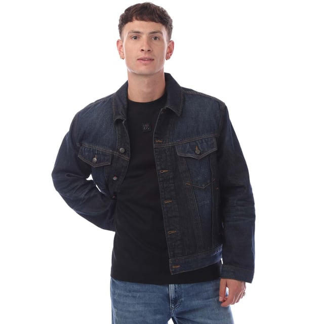Make a versatile addition to your casual wardrobe with this jacket by HUGO Menswear. Crafted in dark-blue raw denim. Hem adjusters  signature trims. This product’s raw material is derived from regenerative agriculture: an approach focused on preservation and restoration that aims to increase biodiversity  preserve water quality and improve soil health while absorbing CO2. Regenerative agriculture also promotes animal welfare and fair working conditions for farmers.- 80% Cotton  20% Cotton (Recycled).- Ref: 50530639405