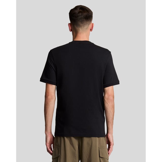 Crew neck design with fine ribbed collar.Short sleeves.Finished with tonal tipped stitching at the cuffs and neckline.Rib knit cuffs.Embroidered Golden Eagle Logo to chest.