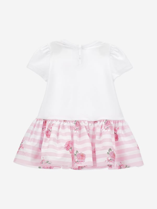 Monnalisa weave beautiful high quality materials with traditional archives. This baby girls dress embodies the Italian label's preference for fashion via a new romantic perspective. The top is crafted from soft jersey with a gathered poplin flounce, gathered armholes, hinted sleeves, and a pink print on the yoke. Made in Italy Round Neckline Teardrop Fastening On Back 95 Cotton, 5 Elastane Spandex 100 Organic Cotton GOTS Certified