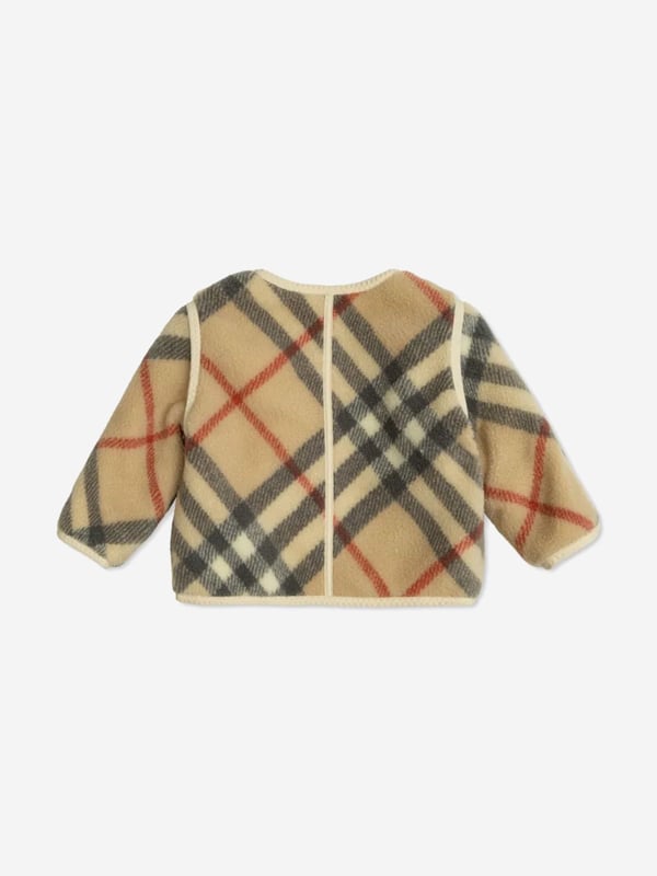 Introducing the exquisite Baby Check Bobby Jacket in Beige by Burberry Kids, an essential addition to the little one's SS2025 wardrobe. Exuding timeless charm and unparalleled comfort, it's perfect for every stylish young adventurer. Here are its standout features Iconic Check Design Classic Burberry plaid infuses a quintessentially British charm. Superior Comfort Crafted from premium materials for a soft, gentle touch on delicate skin. Versatile Elegance Perfect for casual outings or chic events, this jacket ensures your child is always best dressed.Elevate your childs style with this sublime Bobby Jacket. Shop now!