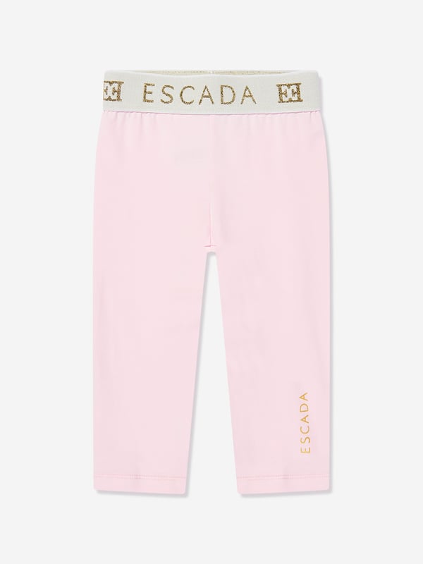 Introducing the exquisite Escada Baby Girls Logo Leggings in Pink a quintessential addition to any young fashionista's SS2025 wardrobe. Fashioned from superior materials, these leggings promise both unparalleled comfort and chic sophistication. Delight in their key features Distinctive Logo Detail Embossed with the iconic Escada logo for an authentic designer touch. Luxurious Comfort Crafted with the softest fabrics to ensure your little one enjoys every moment in sheer comfort. Perfectly Pink A vibrant shade that radiates charm and style.Elevate your child's ensemble with a piece that blends luxury with playful flair. Secure a pair today!