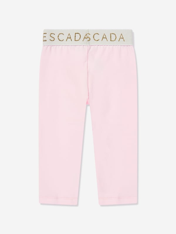 Introducing the exquisite Escada Baby Girls Logo Leggings in Pink a quintessential addition to any young fashionista's SS2025 wardrobe. Fashioned from superior materials, these leggings promise both unparalleled comfort and chic sophistication. Delight in their key features Distinctive Logo Detail Embossed with the iconic Escada logo for an authentic designer touch. Luxurious Comfort Crafted with the softest fabrics to ensure your little one enjoys every moment in sheer comfort. Perfectly Pink A vibrant shade that radiates charm and style.Elevate your child's ensemble with a piece that blends luxury with playful flair. Secure a pair today!