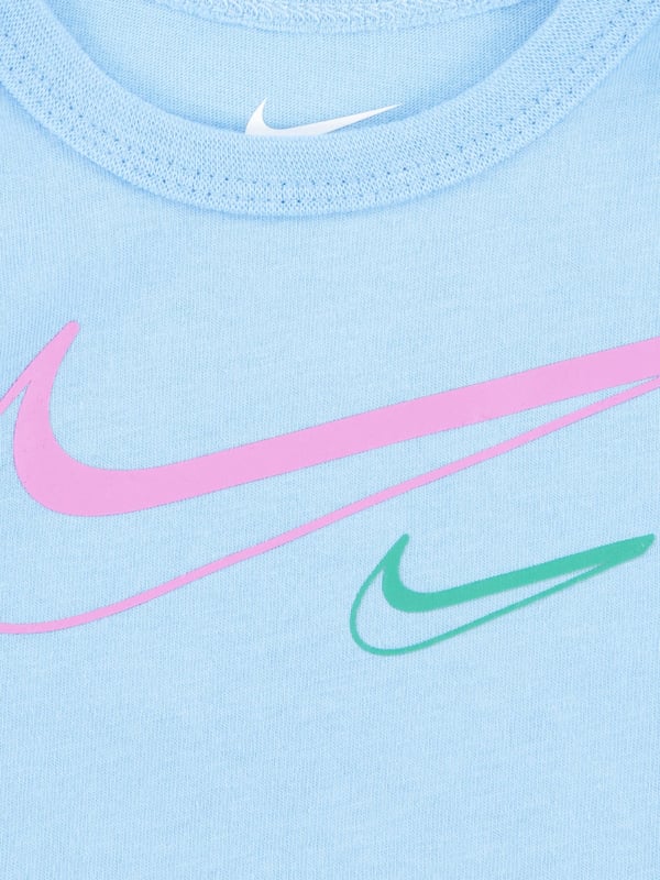 Introducing the chic and stylish Baby Girls Swoosh Logo 3 Piece Set in Black from Nike. Tailored specifically to add a touch of elegance to your baby girl's SS2024 wardrobe, this set complements every occasion. Exclusive Swoosh Logo This unique set adorns the trendy Swoosh logo from Nike, offering a fashionable look for your little princess. Luxurious Comfort Crafted from premium-quality materials, it guarantees absolute comfort, making it a perfect choice for your baby's daily ventures. Complete Ensemble The 3-piece set in black is a singular solution to revamp your baby or baby girl's wardrobe, promising an elevated style quotient. Order today and let your baby girl flaunt her style in vogue!