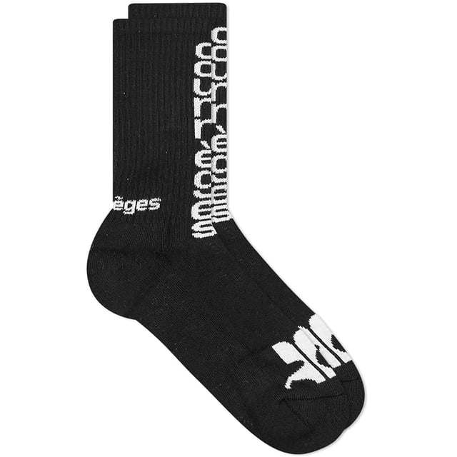 • Brand: Courrèges
 • Material: MAIN FABRIC:90% COTTON 7% POLYAMID/NYLON 3% ELASTHANE
 • Design: Made with a stretchy, comfortable fabric, the Courrèges Shell Socks hug your feet and ankles with a sleek fit that’s perfect for both everyday wear and styling with statement trainers.
 • Colour: Noir
 • Style: Simple, sharp, and just a bit unexpected—these are socks for when you want to stand out quietly