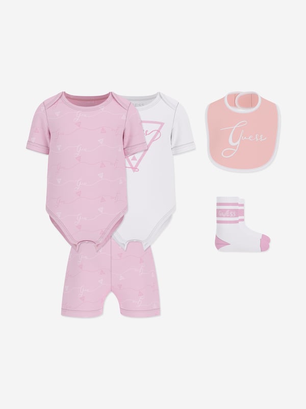 Introducing the exquisite Baby Girls Bodysuit Set in Pink by Guess, a quintessential addition to your little darling's wardrobe for SS2025. Perfectly blending elegance with comfort, here are the splendid features Captivating Pink Hue A soft, charming pink that complements her delightful glow. Luxurious Comfort Crafted from premium fabrics to ensure your angel enjoys supreme softness. Distinguished Design Chic detailing and Guess's signature style make this bodysuit a trendsetter.Revitalize your baby girl's collection with this elegant set. Order now and elevate her style!