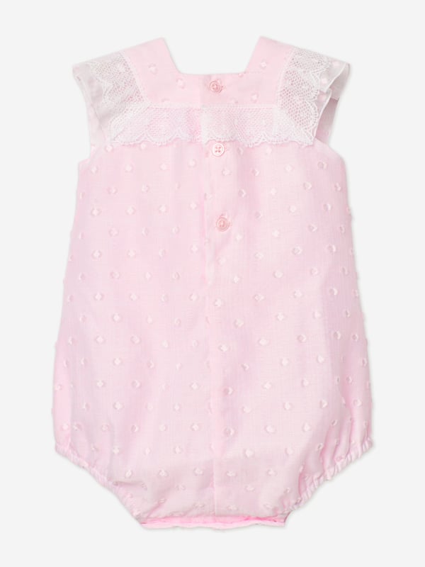 Discover the charm of the Paz Rodriguez Baby Girls Lace Trim Romper in Pink, a sublime addition to your little darling's SS2025 wardrobe. Exquisitely crafted in Spain, this romper merges tradition with a splash of contemporary chic. Crafted in Spain Impeccably made with premium materials for comfort and longevity. Delicate Pink Hue A soft, feminine colour perfect for any occasion. Elegant Lace Detailing Adds a touch of sophistication and timeless grace.Transform your baby girl's attire with this enchanting romper by Paz Rodriguez and let her step into SS2025 with style and elegance.
