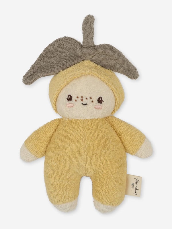 Introducing the Baby Mini Lemon Soft Toy from renowned designer Konges Slojd, a delightful addition to your unisex baby's nursery! Encased in a beautiful ivory hue, this high-caliber creation brings a touch of luxury to childcare. Unique Design This exquisite Soft Toy in a vivid yellow lemon shape provides chic contemporary appeal, adding a refreshing splash of colour to any nursery setting. Soft and Safe Carefully tailored from top-quality materials, this toy guarantees optimum safety and plush cosiness for your precious little one's endless explorations. Perfect Nursery Adornment With its playful design and plush comfort, the Baby Mini Lemon Soft Toy is not only a fantastic plaything, but also a charming décor accessory for your baby's nursery.Transform your baby's playtime with this endearing designer soft toy. Order now for a nursery as stylish as your beloved child!