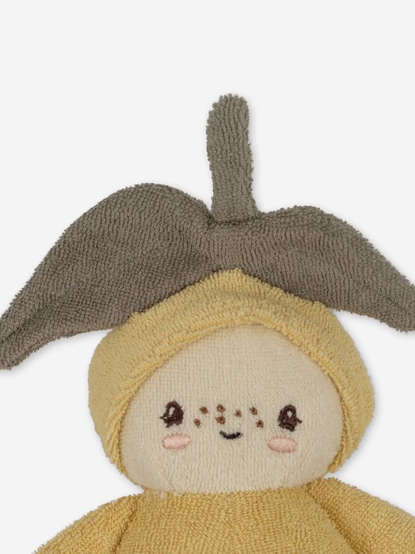 Introducing the Baby Mini Lemon Soft Toy from renowned designer Konges Slojd, a delightful addition to your unisex baby's nursery! Encased in a beautiful ivory hue, this high-caliber creation brings a touch of luxury to childcare. Unique Design This exquisite Soft Toy in a vivid yellow lemon shape provides chic contemporary appeal, adding a refreshing splash of colour to any nursery setting. Soft and Safe Carefully tailored from top-quality materials, this toy guarantees optimum safety and plush cosiness for your precious little one's endless explorations. Perfect Nursery Adornment With its playful design and plush comfort, the Baby Mini Lemon Soft Toy is not only a fantastic plaything, but also a charming décor accessory for your baby's nursery.Transform your baby's playtime with this endearing designer soft toy. Order now for a nursery as stylish as your beloved child!