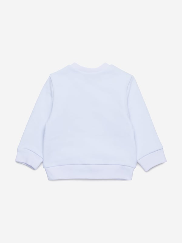 Delight your little one with the Baby Here Comes The Sun Sweatshirt in White by dsquared2 kids. Crafted to uplift their wardrobe with a touch of elegance and comfort for SS2025, it's a pristine choice for any child. Discover its charming attributes Trendy Design Featuring a playful sun motif, ideal for stylish ensembles. Luxurious Comfort Soft fabric ensures all-day ease and frolic. Versatile Style Perfect for both casual outings and special occasions. Elevate your child's fashion flair with this exquisite piece now!