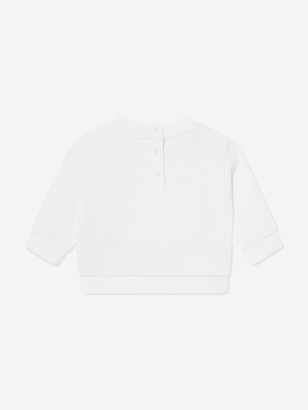 Introducing the exquisite Baby Logo Sweatshirt in White by Balmain, a staple for the SS2025 season. Crafted meticulously to blend high fashion with everyday comfort for your little one. Key features include Iconic Balmain logo Elevates wardrobe with a luxurious touch. Supreme comfort Crafted from premium fabric for softness. Timeless style Classic white hue ensures versatile wear.Revamp your child's collection with flawless elegance. Perfect for any occasion! Order now.