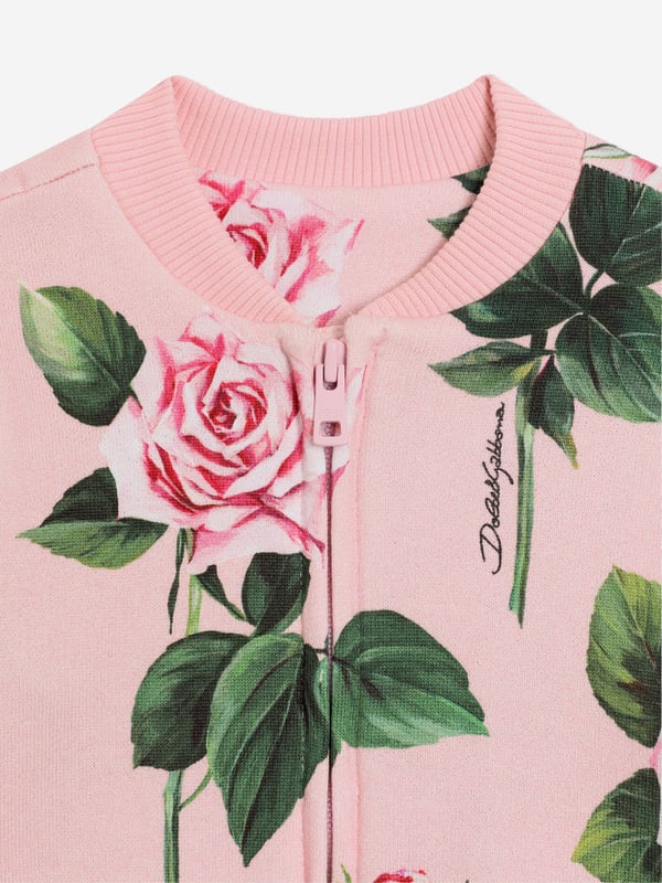 Introducing the exquisite Dolce Gabbana Baby Girls Rose Print Sweatshirt in Pink, a stellar addition for SS2025. Perfectly tailored in Italy, this piece captures high-end fashion for your little one. Features include Italian Craftsmanship Superior quality, durability style. Charming Rose Print Enhances the sweatshirt with playful sophistication. Luxe Comfort Exceptionally soft materials ensure all-day comfort.A radiant ensemble for any young wardrobe ignite fashion passion early!