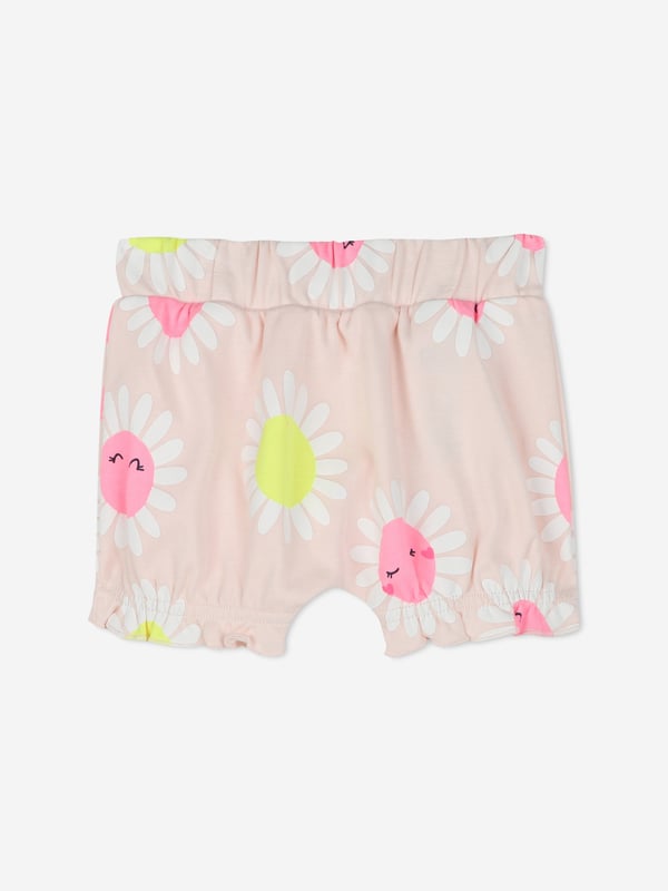 Introducing the exquisite Baby Girls Daisy Short Set in Pink by billieblush, a quintessential addition to any fashionable young wardrobe for SS2025! Key features include Delightful Daisy Motif Sprinkled with charming daisy prints for a chic, playful look. Luxurious Comfort Crafted with premium fabrics that are gentle on delicate skin. Perfect for SS2025 Ideal for summer days with a breathable design to keep your little one cool and stylish.Elevate her style this season a splendid blend of elegance and comfort!