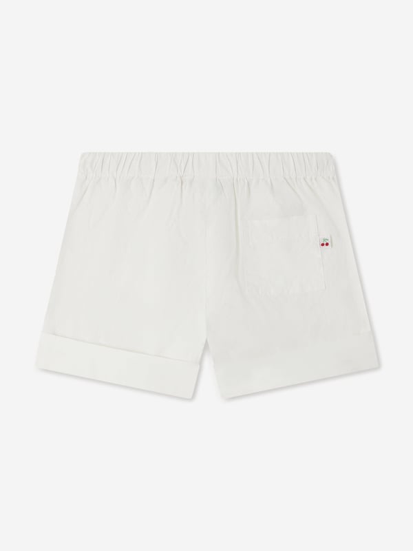 Discover the charm of the Baby Girls Ecandy Shorts in White by Bonpoint, an essential addition to any fashionable young wardrobe for SS2025. Elegance and comfort merge in this luxurious design, tailor-made for your little princess. Pristine White A timeless, versatile shade that offers endless styling options. Superior Fabric Crafted from the finest materials ensuring softness and durability. Iconic Style Bonpoint's signature chic ensures your baby girl is always dressed in top-notch fashion. Elevate her summer look with these exquisite shorts!