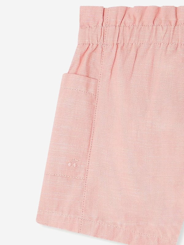 Introducing the exquisite Baby Girls Nougat Shorts in Pink by Bonpoint, a quintessential addition to your little one's SS2025 wardrobe. Stylish yet comfortable, these shorts promise to enchant and delight Luxurious Comfort Crafted from premium fabrics, ensuring a gentle touch against delicate skin. Signature Colour Dressed in a delightful pink hue, perfect for adding a splash of cheer. Elevated Style Chic design melds with functional elegance, suitable for playdates or picnics.Revitalise her summer look with Bonpoint's enchanting creation. Order now and make her season unforgettable!