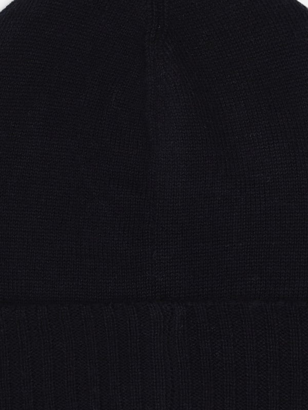 Introducing the Boys Logo Badge Beanie Hat in Navy by BOSS, the perfect addition for stylish warmth in AW2024. Sophisticated yet playful, this designer beanie is a stellar pick for any young trendsetter's wardrobe. Here are the standout features Iconic BOSS Logo Features a prominent, chic badge enhancing its designer appeal. Premium Fabrication Crafted from luxurious, soft materials to keep warm while ensuring comfort. Deep Navy Blue A versatile and classic colour that matches effortlessly with various outfits. Durable Design Built to last, ideal for seasonal adventures and day-to-day wear.Refresh your boy's look this season with this stylish beanie from BOSS. Order now to add a touch of designer flair to his cold-weather ensemble!