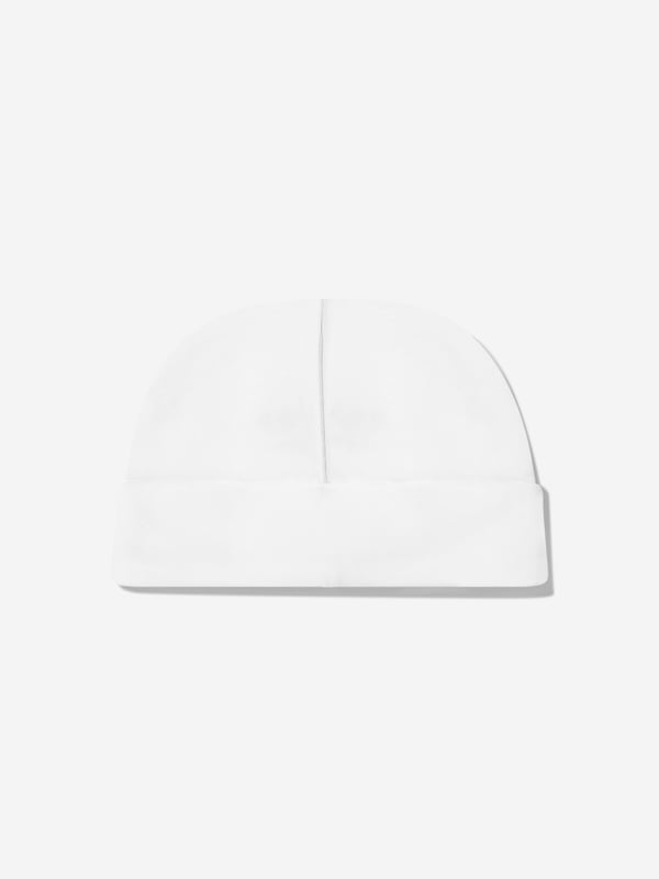 Elevate your little darling's style with the exquisite Baby Girls Embroidered Logo Beanie in White by Escada, a splendid addition for SS2025. Each beanie combines understated elegance and comfort. Key highlights include Luxurious Embroidery Features the iconic Escada logo intricately embroidered, adding a touch of luxury. Premium Material Crafted from the finest fabrics to ensure warmth and comfort against your baby girl's delicate skin. Versatile White A chic, crisp white that complements any outfit, making it perfect for any occasion. Add a flare of sophistication to your baby girls ensemble with this must-have designer beanie.