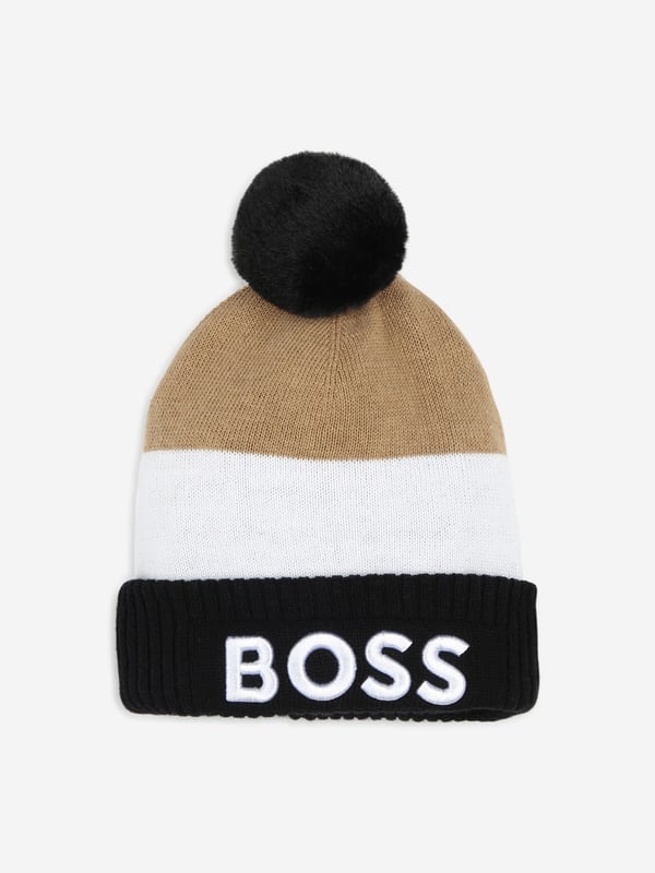 Introducing the BOSS Boys Embroidered Logo Bobble Hat in Black, an elegant staple for AW2024. Immerse your young one in the luxury and comfort of this designer accessory. Luxurious Feel Crafted with premium materials for unrivaled comfort. Iconic BOSS Embroidery Features a distinctively embroidered logo for a touch of class. Versatile Design Perfect for stylish warmth during chilly seasons.Elevate your boy's fashion ensemble with this exquisite bobble hat from BOSS.