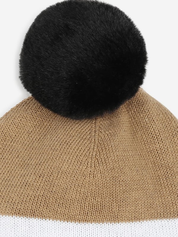 Introducing the BOSS Boys Embroidered Logo Bobble Hat in Black, an elegant staple for AW2024. Immerse your young one in the luxury and comfort of this designer accessory. Luxurious Feel Crafted with premium materials for unrivaled comfort. Iconic BOSS Embroidery Features a distinctively embroidered logo for a touch of class. Versatile Design Perfect for stylish warmth during chilly seasons.Elevate your boy's fashion ensemble with this exquisite bobble hat from BOSS.