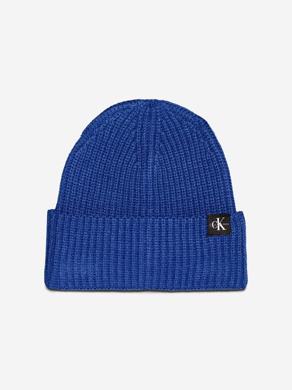 Introducing the Boys Monogram Rib Beanie Hat in Blue, crafted by Calvin Klein Jeans a premier accessory for the discerning young wardrobe for AW2024. Experience sophistication and cosy warmth with every wear Signature Monogram Design Features Calvin Klein's iconic logo in a subtle, stylish monogram pattern. Luxe Fabric Blend Constructed with premium materials, ensuring a soft touch and durable wear. Vibrant Blue Hue A striking blue colour that complements any outfit, making it both versatile and fashionable. Perfect Fit Ribbed knit offers a snug, comfortable fit that stays in place during all activities.Revamp your boy's style statement with this sophisticated and chic beanie. Ideal for chilly days and cool evenings, let him showcase his flair in Calvin Klein comfort and style!