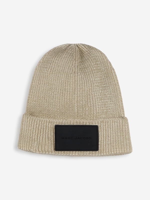 Introducing the Girls Knitted Logo Beanie Hat in Gold from marc_jacobs, the pinnacle of AW2024 chic for your girl. Embrace the elegance and warmth of this must-have accessory. Luxurious Material Crafted with premium yarns for a soft, Cosy feel. Striking Gold Tone A rich, eye-catching gold hue that radiates style and sophistication. Signature Logo Design Adorned with the iconic marc_jacobs logo for an unmistakable touch of luxury.Transform her look this season with the marc_jacob's Gold Beanie. A blend of comfort, style, and warmth, perfect for the fashion-forward youngster.