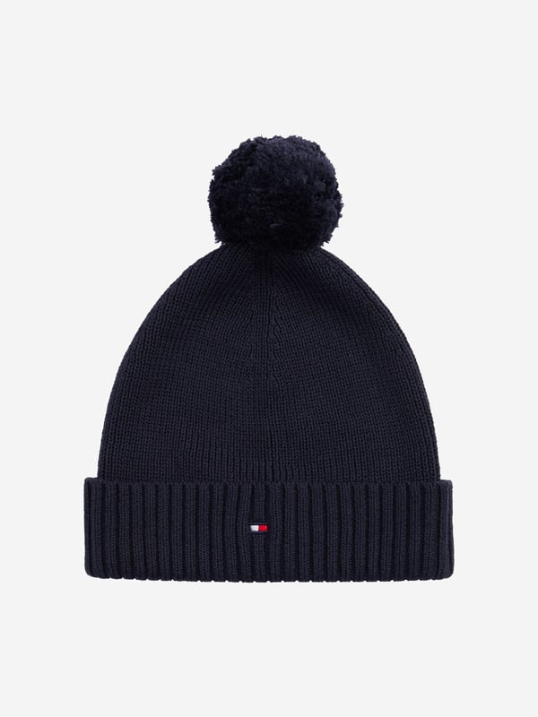 Introducing the Kids Essential Pom Pom Beanie Hat in Navy from Tommy Hilfiger, an impeccable choice for your child's SS2025 wardrobe. Classic Navy Hue Crafted in a versatile navy, this beanie complements any outfit. Signature Tommy Appeal Adorned with the iconic logo, ensuring a touch of designer luxury. Unisex Design Perfect for both boys and girls, enhancing its practicality. Cosy Fit Made with premium materials to keep your little one warm during chillier days.Revitalise your child's look with this stylish piece. Shop now!