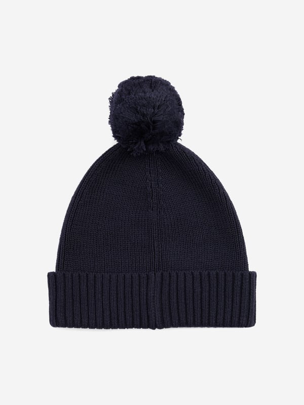 Introducing the Kids Essential Pom Pom Beanie Hat in Navy from Tommy Hilfiger, an impeccable choice for your child's SS2025 wardrobe. Classic Navy Hue Crafted in a versatile navy, this beanie complements any outfit. Signature Tommy Appeal Adorned with the iconic logo, ensuring a touch of designer luxury. Unisex Design Perfect for both boys and girls, enhancing its practicality. Cosy Fit Made with premium materials to keep your little one warm during chillier days.Revitalise your child's look with this stylish piece. Shop now!