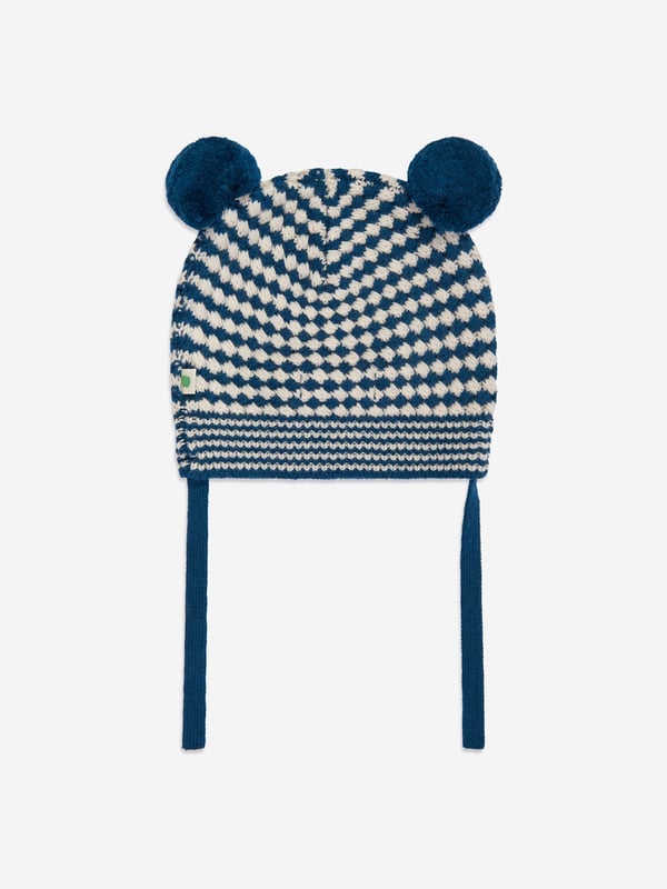 Introducing the Boys Hazel Chunky Checker Hat in Blue by the bonnie mob. Designed to strike a balance between style and warmth for AW2024, this hat is an exquisite addition to any Baby, Baby Boy, or Boy's wardrobe. Discover its standout features Luxe Comfort Crafted with premium, soft materials to ensure warmth and comfort in the cooler months. Eye-Catching Design Features a bold, chunky checker pattern in striking blue shades that enhance any outfit. Versatile Style Suitable for casual outings and special occasions, complementing any ensemble effortlessly. Durable Quality Constructed to endure, maintaining style and comfort through the season.Elevate your child's look with this sophisticated piece from the bonnie mob!