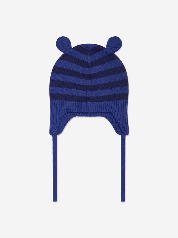 Introducing the luxurious Baby Boys Damson Knit Hat With Ears in Blue by the bonnie mob, perfect for AW2024. Designed with exceptional care, this hat combines playful charm and warmth for your little one. Charming Ears Detail Fun and functional, the cute ear accents are a highlight, ensuring your boy stands out. Premium Comfort Crafted from the finest knit for a soft, snuggly feel, keeping your baby cosy on chilly days. Vibrant Blue colour A rich blue hue adds a splash of colour to any outfit, making it both stylish and versatile.Elevate your child's cold-weather style now with this exquisite knit hat!