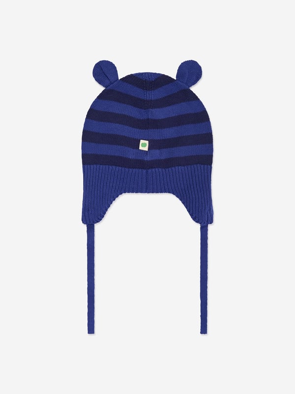 Introducing the luxurious Baby Boys Damson Knit Hat With Ears in Blue by the bonnie mob, perfect for AW2024. Designed with exceptional care, this hat combines playful charm and warmth for your little one. Charming Ears Detail Fun and functional, the cute ear accents are a highlight, ensuring your boy stands out. Premium Comfort Crafted from the finest knit for a soft, snuggly feel, keeping your baby cosy on chilly days. Vibrant Blue colour A rich blue hue adds a splash of colour to any outfit, making it both stylish and versatile.Elevate your child's cold-weather style now with this exquisite knit hat!
