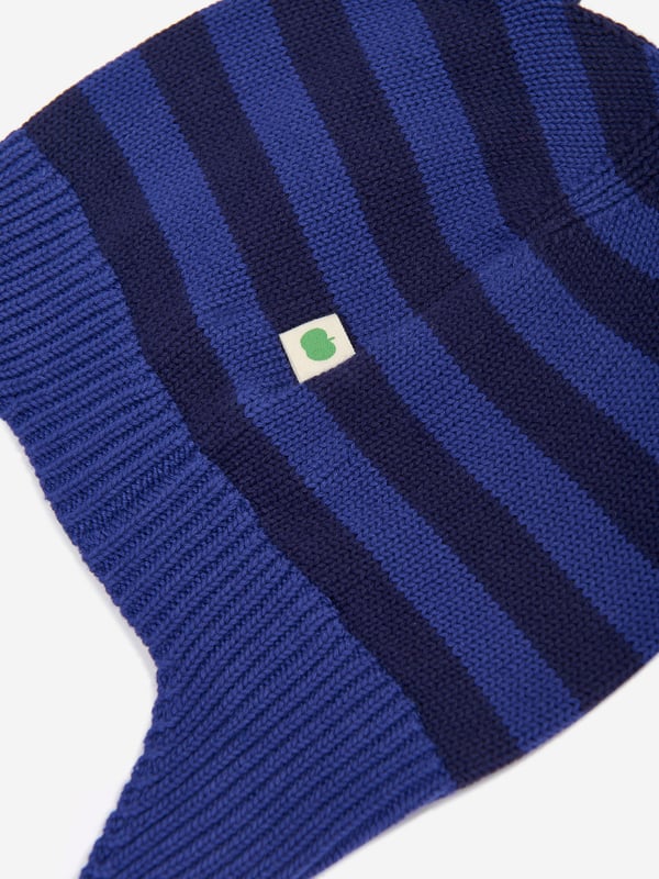 Introducing the luxurious Baby Boys Damson Knit Hat With Ears in Blue by the bonnie mob, perfect for AW2024. Designed with exceptional care, this hat combines playful charm and warmth for your little one. Charming Ears Detail Fun and functional, the cute ear accents are a highlight, ensuring your boy stands out. Premium Comfort Crafted from the finest knit for a soft, snuggly feel, keeping your baby cosy on chilly days. Vibrant Blue colour A rich blue hue adds a splash of colour to any outfit, making it both stylish and versatile.Elevate your child's cold-weather style now with this exquisite knit hat!