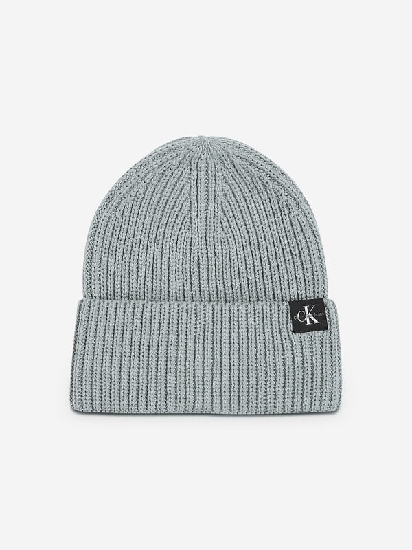 Introducing the Calvin Klein Kids Monogram Rib Beanie in Green the quintessential addition to any boy's or girl's wardrobe for AW2024. Elegant in design and vibrant in shade, this beanie blends comfort with iconic style Luxurious Comfort Crafted from premium fibres, ensuring a soft, cosy fit. Signature Monogram Features the classic Calvin Klein monogram for a touch of designer flair. Versatile Style Perfect for both casual and more elegant occasions.Elevate your child's style this autumn and winter. Order now and witness timeless sophistication meet modern comfort.
