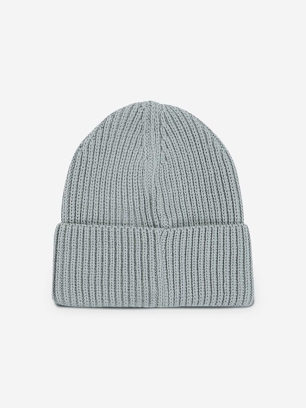 Introducing the Calvin Klein Kids Monogram Rib Beanie in Green the quintessential addition to any boy's or girl's wardrobe for AW2024. Elegant in design and vibrant in shade, this beanie blends comfort with iconic style Luxurious Comfort Crafted from premium fibres, ensuring a soft, cosy fit. Signature Monogram Features the classic Calvin Klein monogram for a touch of designer flair. Versatile Style Perfect for both casual and more elegant occasions.Elevate your child's style this autumn and winter. Order now and witness timeless sophistication meet modern comfort.
