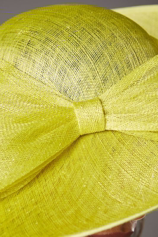Striking wide brim design crafted from natural Abaca fabric for a lightweight yet structured silhouette
        Elegant bow detail adds a feminine touch and creates a focal point for your occasion ensemble
        Versatile one-size design suitable for various head shapes and hairstyles
        Dramatic brim provides stylish sun protection whilst framing the face beautifully
        Handcrafted construction ensures each hat maintains its distinctive character and shape
    
    The Lisa Tan Wide Brim Hat exemplifies Coast's signature sophistication, perfect for elevating your special occasion attire. The dramatic silhouette creates an instant statement, whilst the delicate bow detail adds a touch of refined femininity. Style with a coordinating dress as shown by our model for a harmonious look, or create contrast with complementary tones for added visual interest. This hat works beautifully for summer weddings, race day events, or garden parties where you wish to make an impression. The natural Abaca construction offers both structure and breathability, ensuring comfort throughout your event. For travel, store flat or upside down in a hat box to maintain its distinctive shape. A truly timeless accessory that will serve you for numerous special occasions.