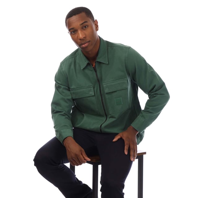 Mens Hugo Boss Lovel 15 Overshirt in green.- Classic collar.- Full zip fastening.- Two front chest pockets.- BOSS logo patch on the left chest.- Regular fit. - 100% Cotton.- Ref: 50530853343