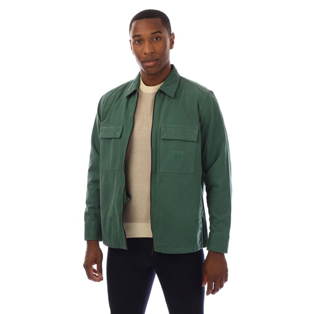 Mens Hugo Boss Lovel 15 Overshirt in green.- Classic collar.- Full zip fastening.- Two front chest pockets.- BOSS logo patch on the left chest.- Regular fit. - 100% Cotton.- Ref: 50530853343