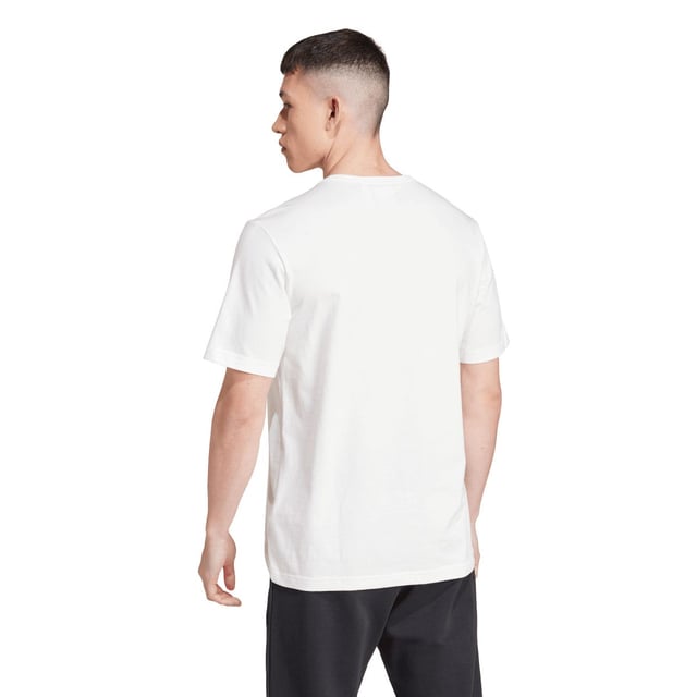 Mens adidas Originals Graphic T-Shirt in cloud whiteSlip into this adidas tee and show off retro-cool style. Inspired by one of the biggest sporting events in the world  a colourful logo graphic anchors your look in legacy. Smooth cotton keeps it casual and comfortable. Pair it with joggers for a laid-back vibe or distressed jeans to remix the retro inspiration.- Celebrate sport in this comfy tee.- Regular fit- Ribbed crewneck- 100% cotton- Machine wash cold delicate cycle- Ref: IW3237