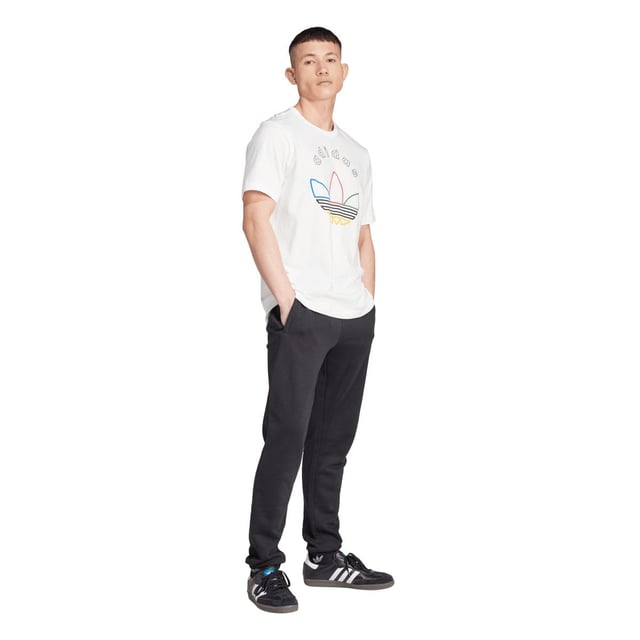 Mens adidas Originals Graphic T-Shirt in cloud whiteSlip into this adidas tee and show off retro-cool style. Inspired by one of the biggest sporting events in the world  a colourful logo graphic anchors your look in legacy. Smooth cotton keeps it casual and comfortable. Pair it with joggers for a laid-back vibe or distressed jeans to remix the retro inspiration.- Celebrate sport in this comfy tee.- Regular fit- Ribbed crewneck- 100% cotton- Machine wash cold delicate cycle- Ref: IW3237