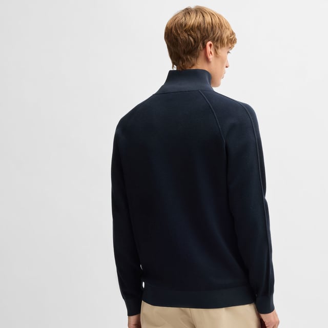 Mens BOSS H-Domico Zip-Up Cardigan in cotton and virgin wool in dark blueA zip-front cardigan with contrasting ribbing by BOSS. This layer is cut to a regular fit and blended with soft virgin wool. This product is partly made with organic cotton. Our organic standards do not allow the use of synthetic fertilisers  pesticides or genetically modified seeds.- Regular fit- Zip neck- Long sleeves- Pockets top: Zip pockets- Standard length- Main material: 70% Cotton  30% Virgin wool.  Ribbing: 100% Polyester.  Machine washable.- Ref: 50519629-405
